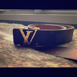 Louis vulton belt.      Ferragamo belt